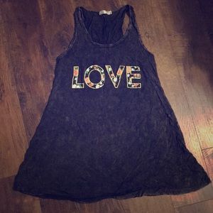 Adorable ‘worn out’ look swim suit cover up